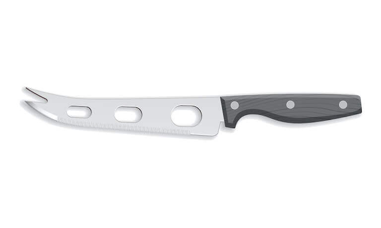 Closeup of a cheese knife on white background.