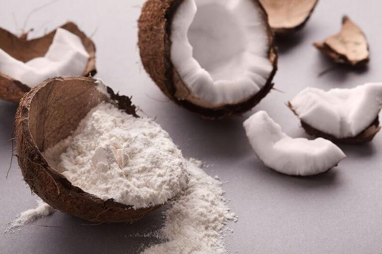 Coconut shell filled with coconut flour.