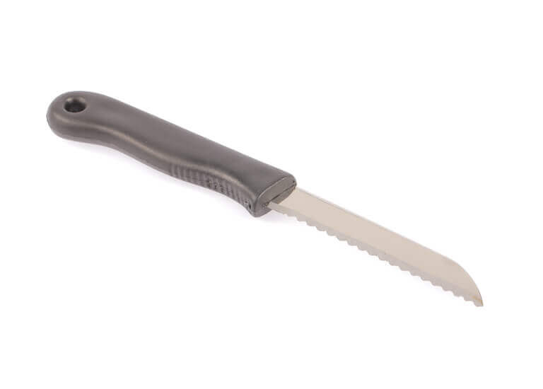 Closeup of a tomato knife on white background.